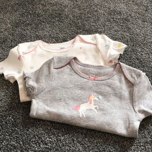 2 pc Infant girl bodysuits with short sleeves.